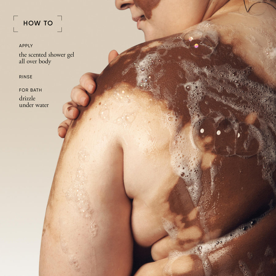 Person with brown soap suds on body, instructions for using scented shower gel.