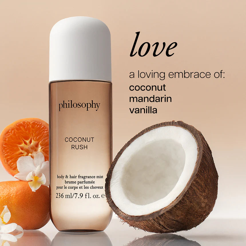 Philosophy Coconut Rush fragrance bottle with a coconut and orange on a beige background