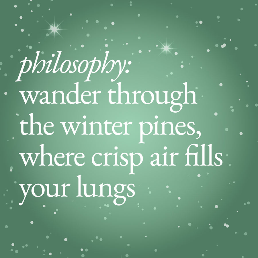 A square graphic with a soft green background, white text reading 'philosophy: wander through the winter pines, where crisp air fills your lungs,' and small white star and dot accents.